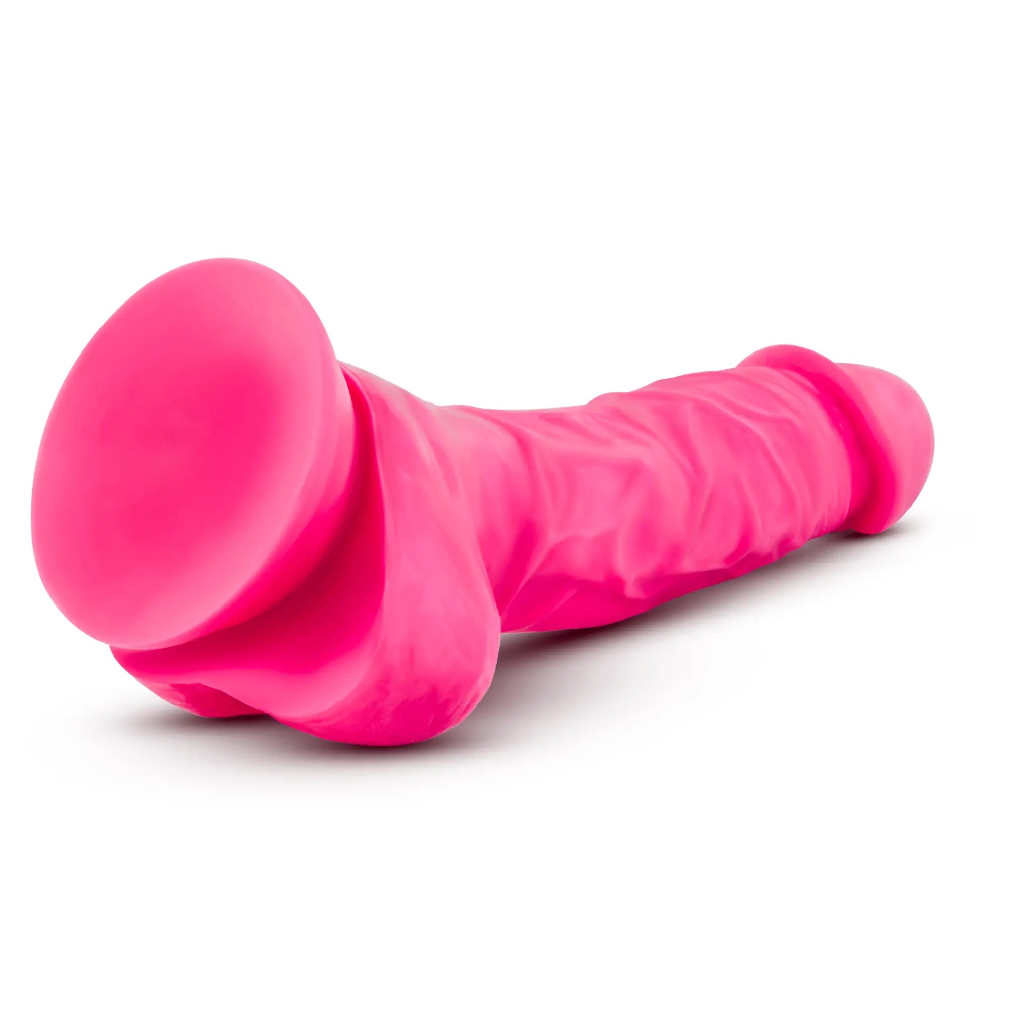 Neo Elite 7.5in silicone dual density cock neon pink with textured ridges and suction cup for secure placement