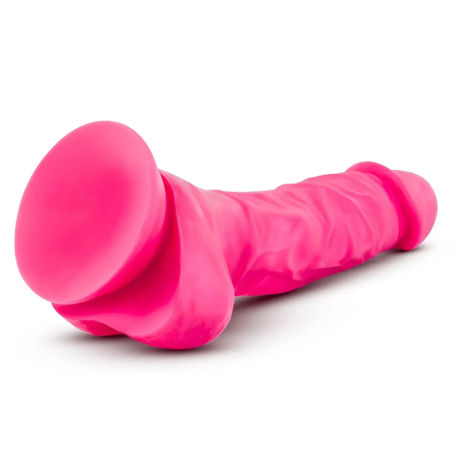 Neo Elite 7.5in silicone dual density cock neon pink with textured ridges and suction cup for secure placement