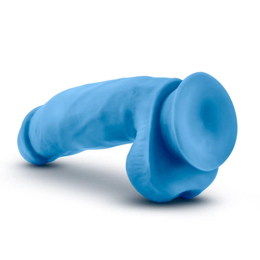 Neo Elite 7in silicone dual density cock ring with balls in neon blue featuring a suction cup design