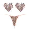 Heart-shaped sequin adhesive pads and sheer nude thong with pink trim from neva nude bubbly feels set one size