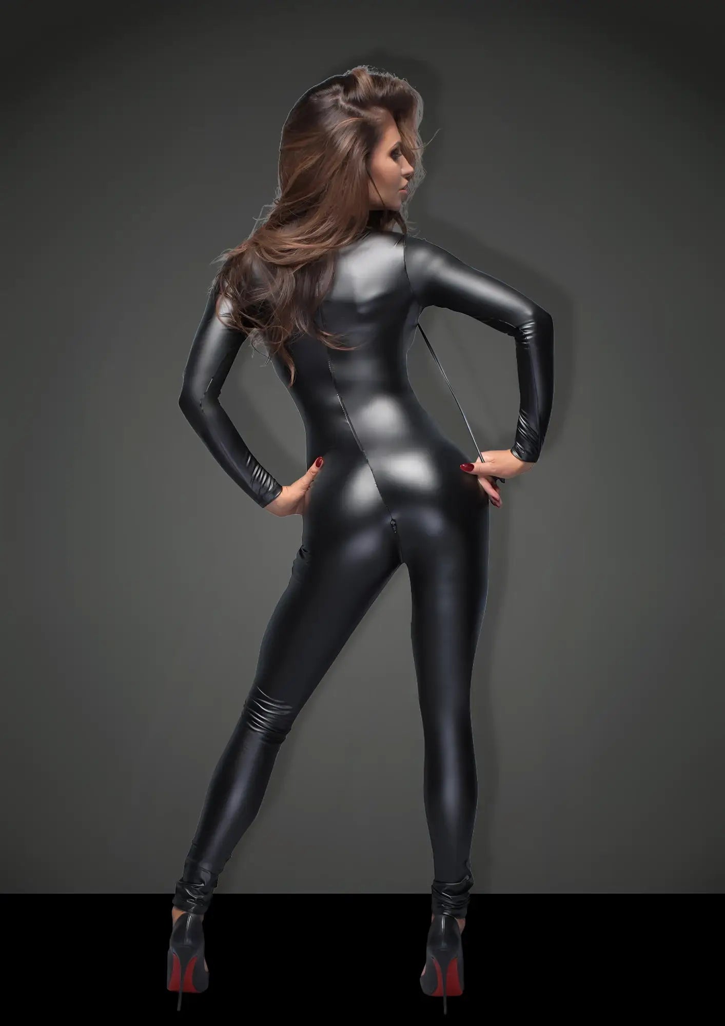 Black glossy latex long sleeve catsuit with high collar featuring leash and two way zipper for versatile wear