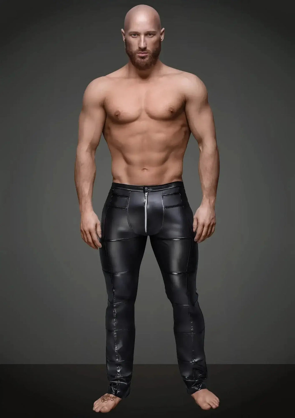 Black glossy faux leather pants with central front zipper and stitched paneling from noir sexy pants with hot details m