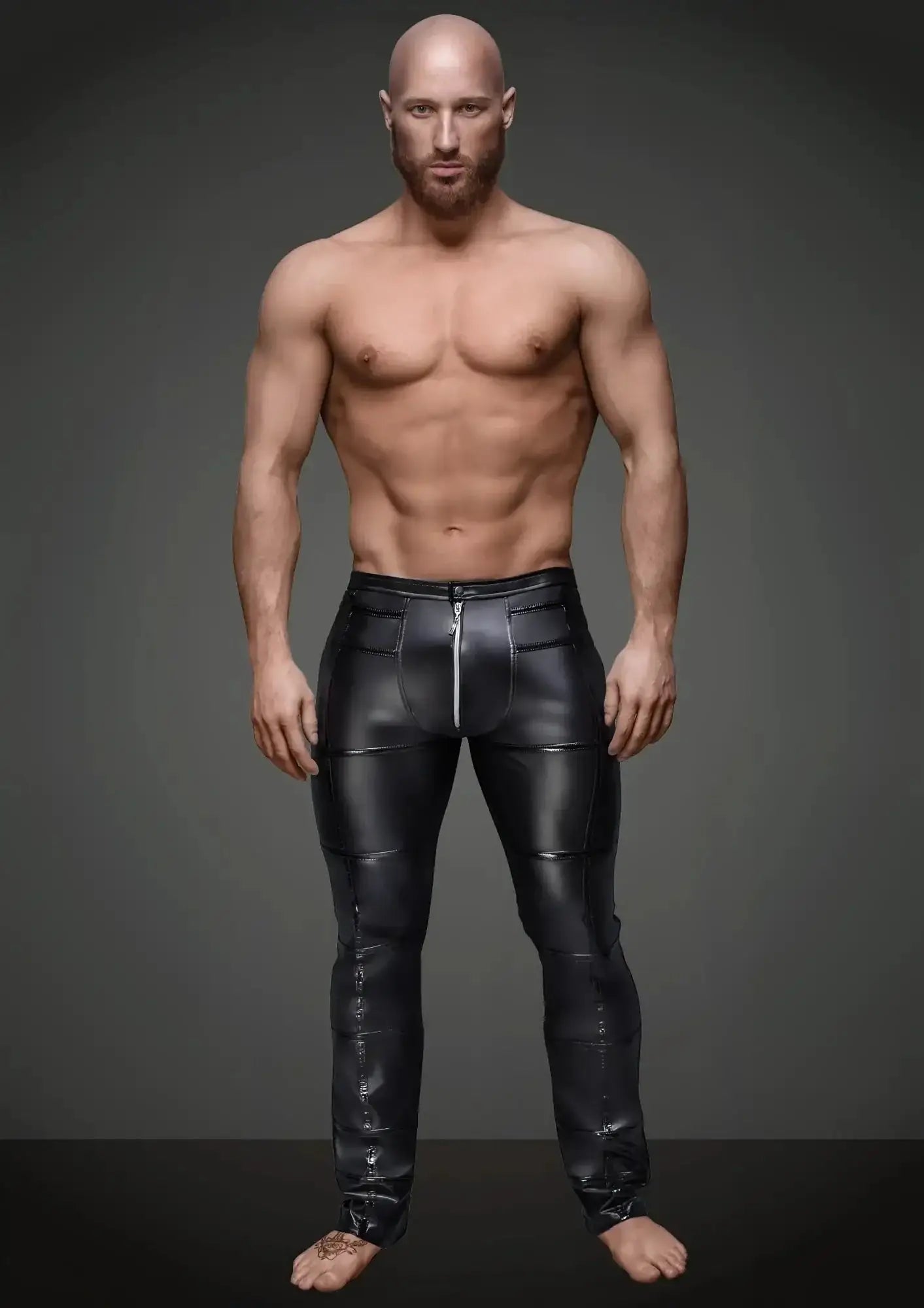 Black glossy faux leather pants with central front zipper and stitched paneling from noir sexy pants with hot details m
