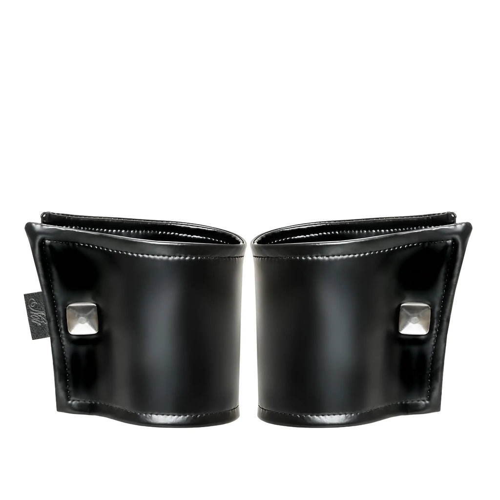 Black leather noir wrist wallet with silver square studs and hidden zipper in one size shown from front side