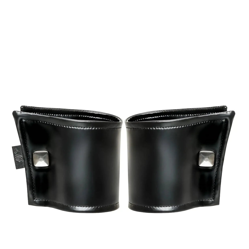 Black leather noir wrist wallet with silver square studs and hidden zipper in one size shown from front side