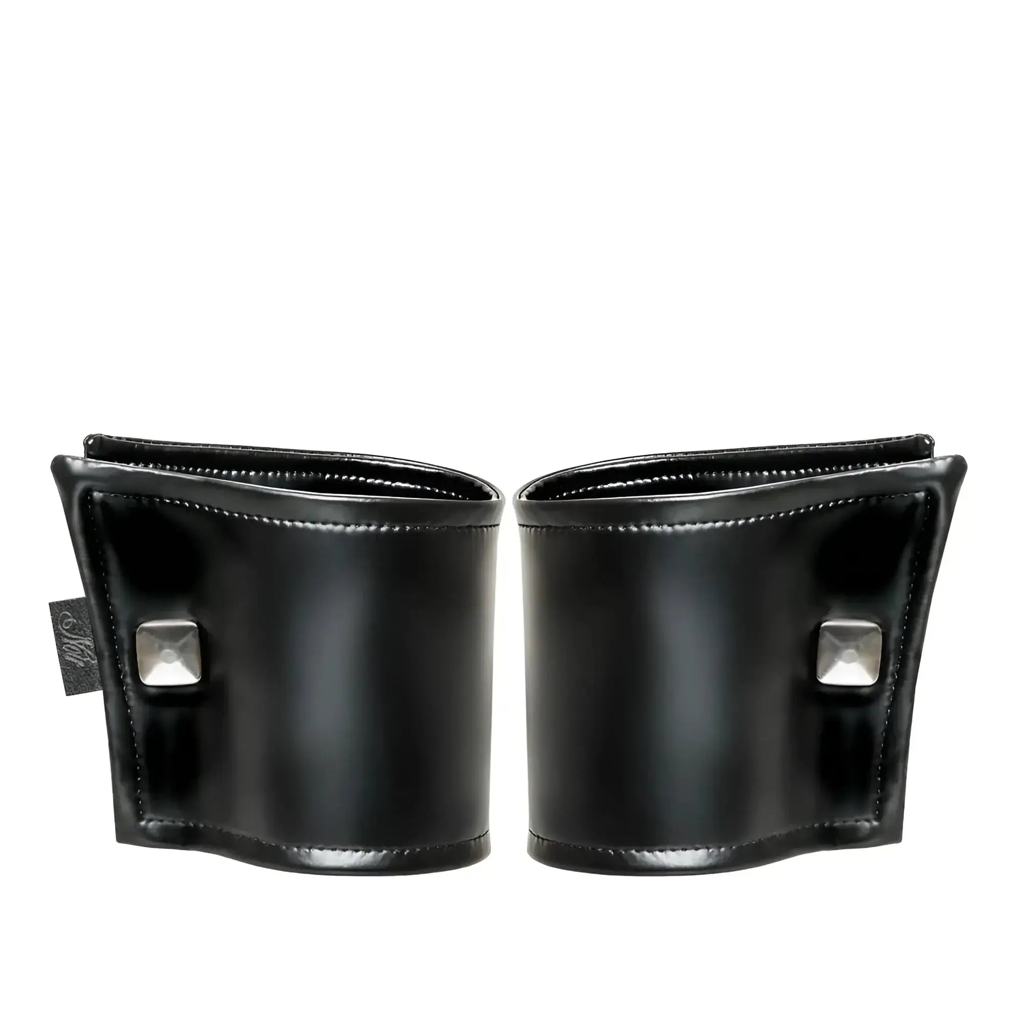 Black leather noir wrist wallet with silver square studs and hidden zipper in one size shown from front side