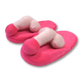 Pink plush novelty pecker slippers featuring light pink stuffed phallic-shaped thong straps for indoor use