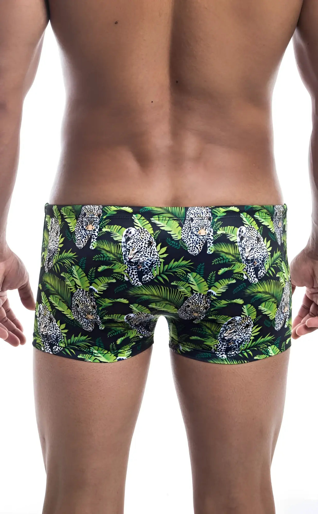 Oceanico square cut green and black swim trunks with vibrant tropical leopard and foliage pattern