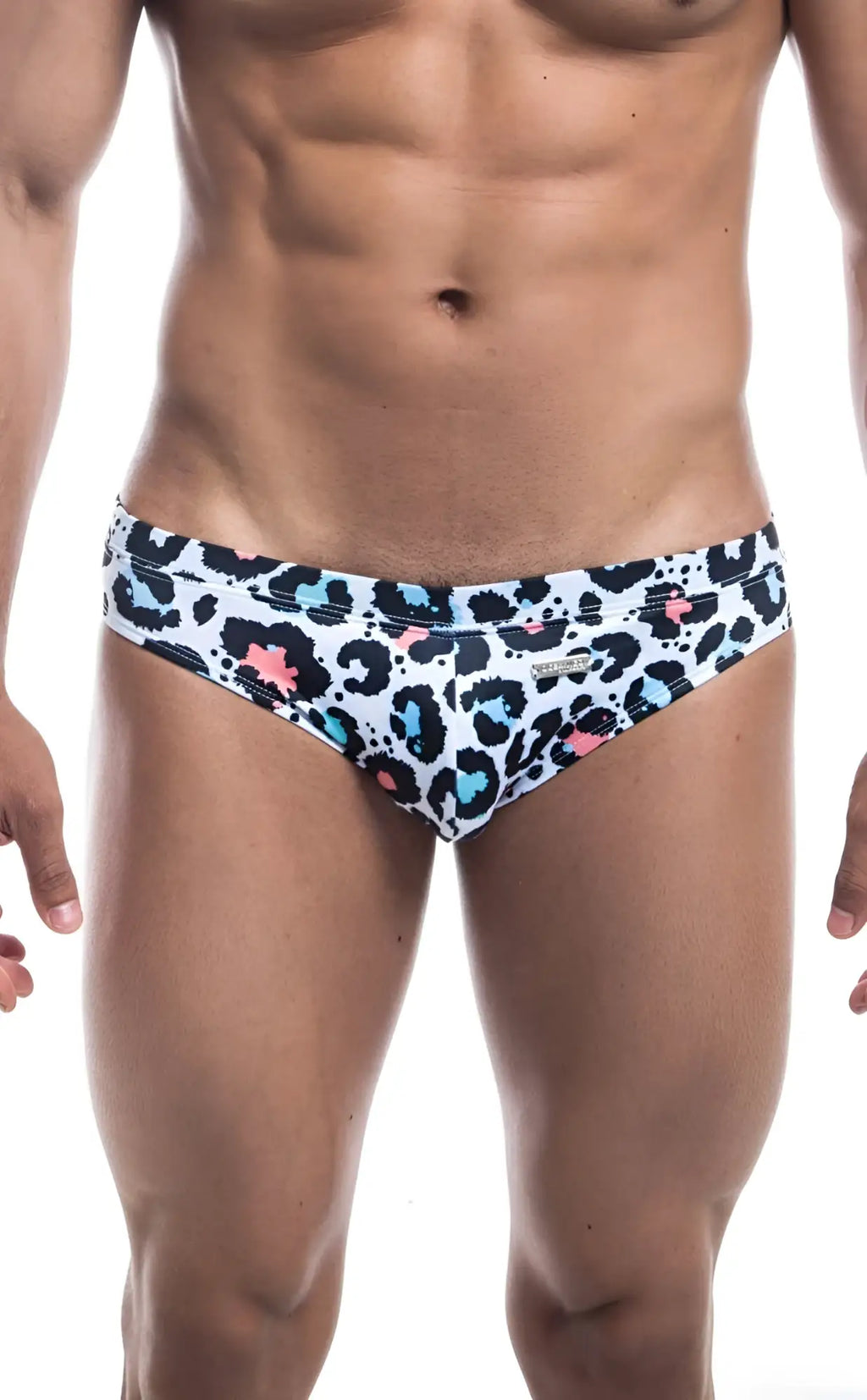 Oceanico swim bikini white swim trunks with bold leopard print black spots and pink teal accents for beachwear