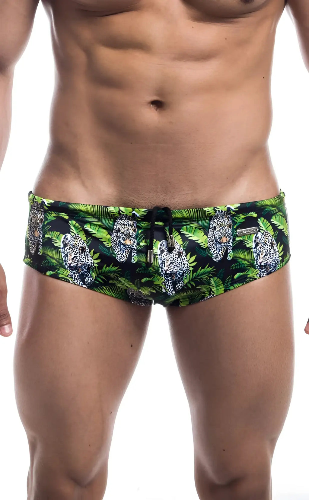Oceanico swim brief in green and black with vibrant jungle pattern featuring white-spotted leopards and lush foliage