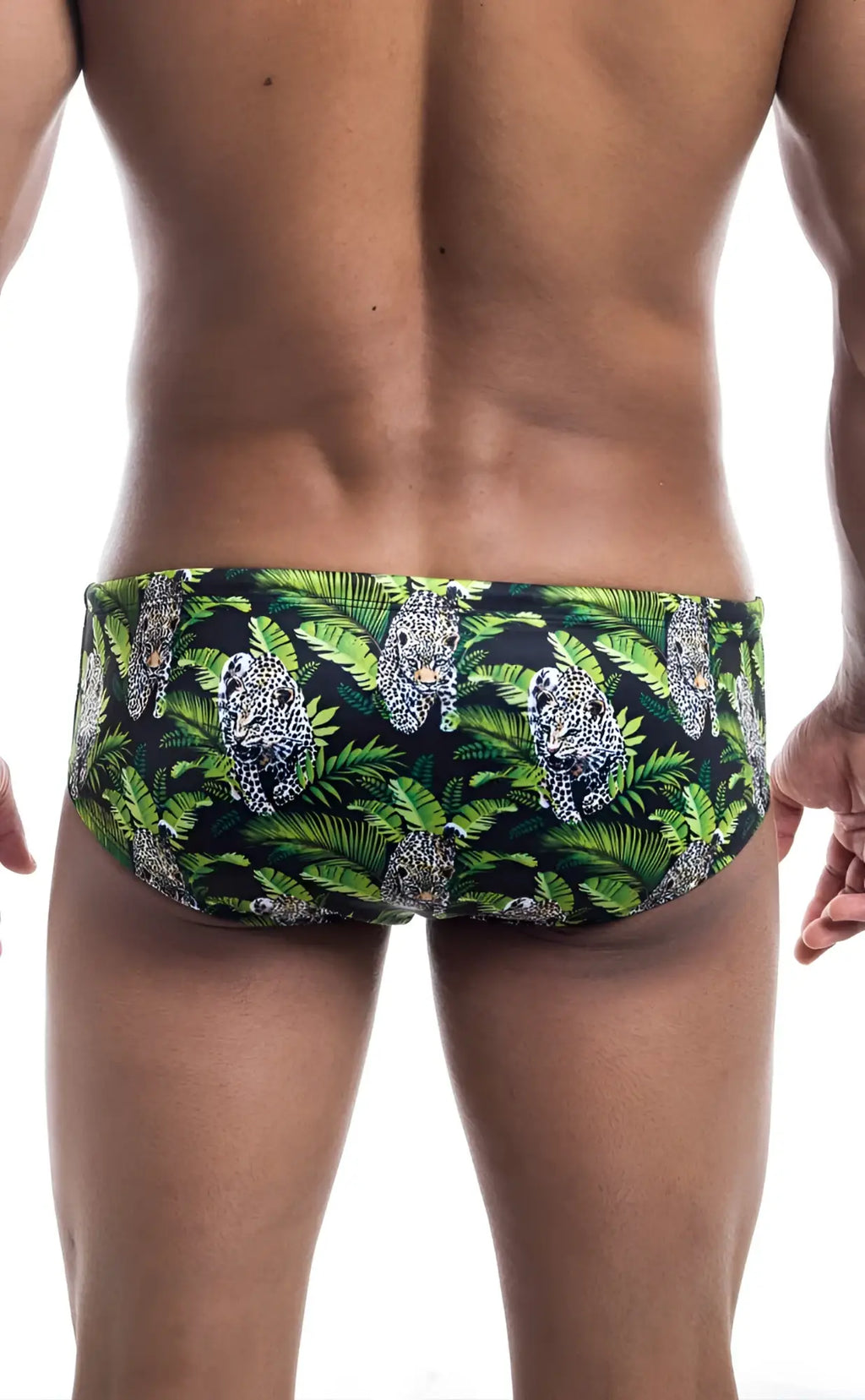Oceanico swim brief in green and black with vibrant jungle pattern featuring leopards and tropical leaves