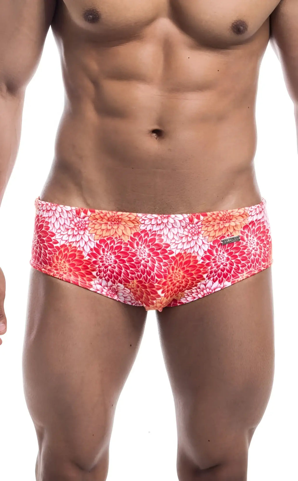 Oceanico swim brief with vibrant floral pattern in pink red and orange on white base ideal for beachwear