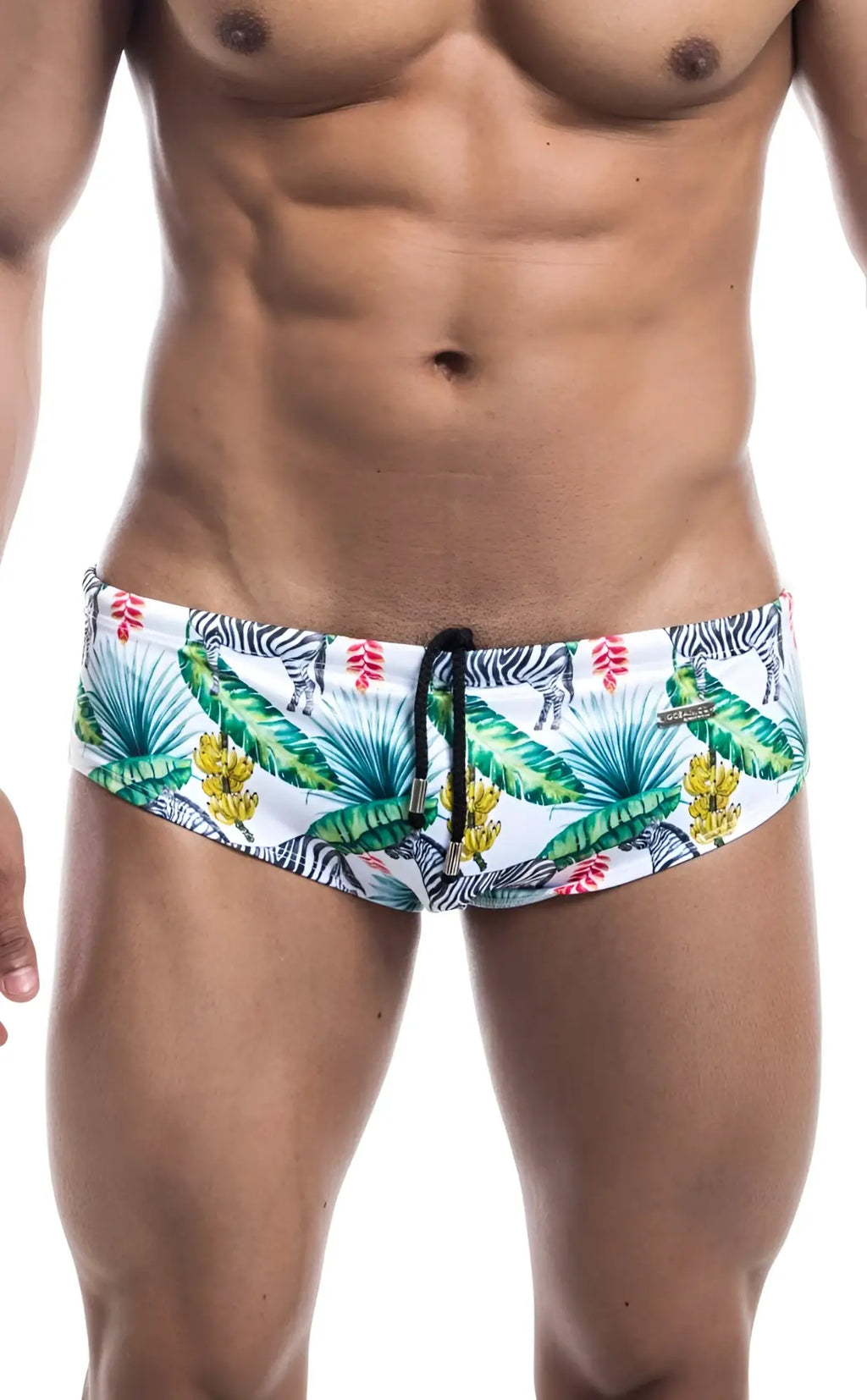 White Oceanico swim brief with vibrant tropical print of green palm leaves yellow flowers and black and white zebras