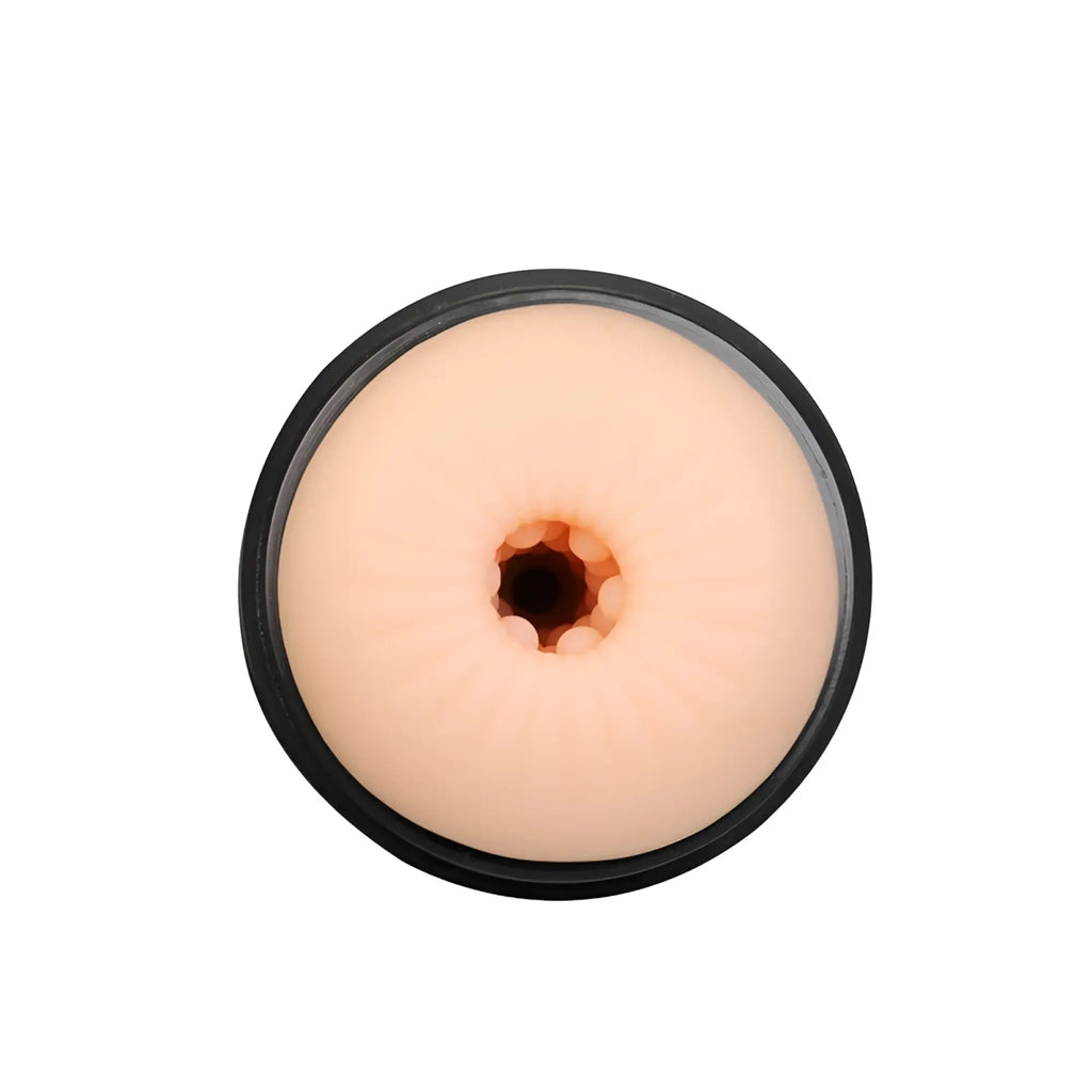Beige silicone anal plug with black circular base and textured inner rim for OTouch Airturn 3 suction masturbator vaginal