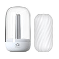 White otouch branded humidifier with clear glass dome and silver stem next to matching white twisted-textured diffuser head