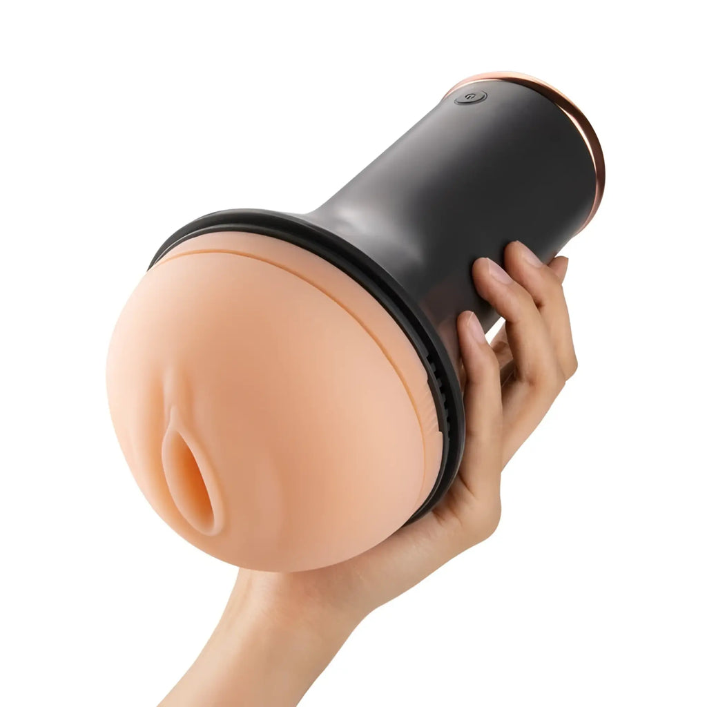 Black and rose gold silicone adult toy OTouch Inscup 1 heating vibration masturbator with peach realistic design