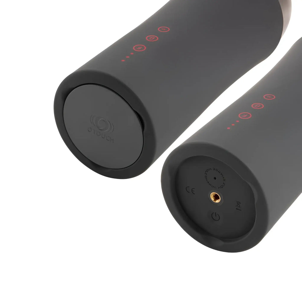 Black cylindrical handheld OTouch Inscup 2 contracting vibrating USB masturbator with red LED indicator lights and logo base