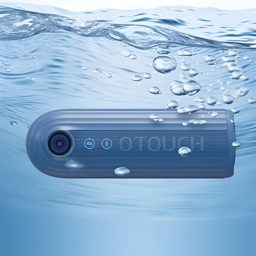 Blue otouch underwater camera with textured grip and illuminated buttons for the otouch submarine submersible vibrating masturbator