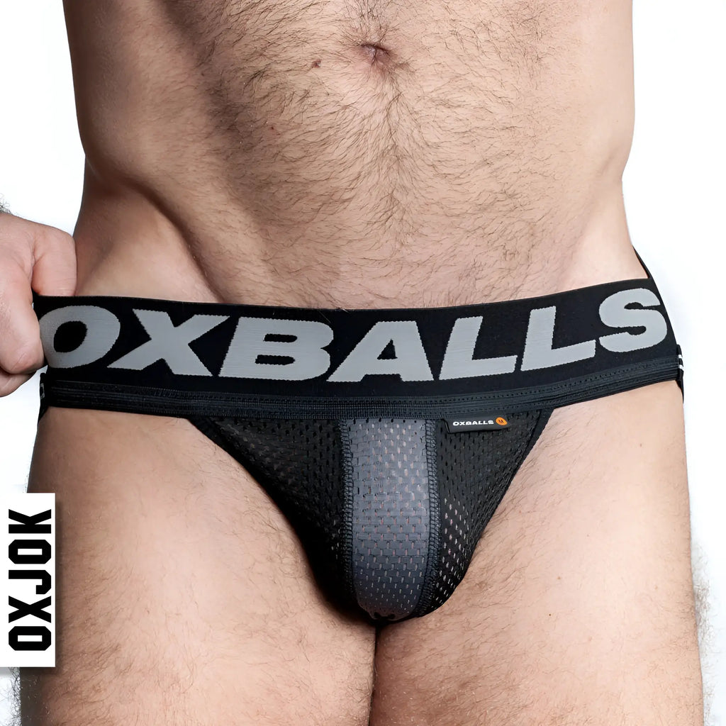 Black mesh briefs oxballs airmesh swagger jockstrap tar with gray oxballs logo on waistband front view