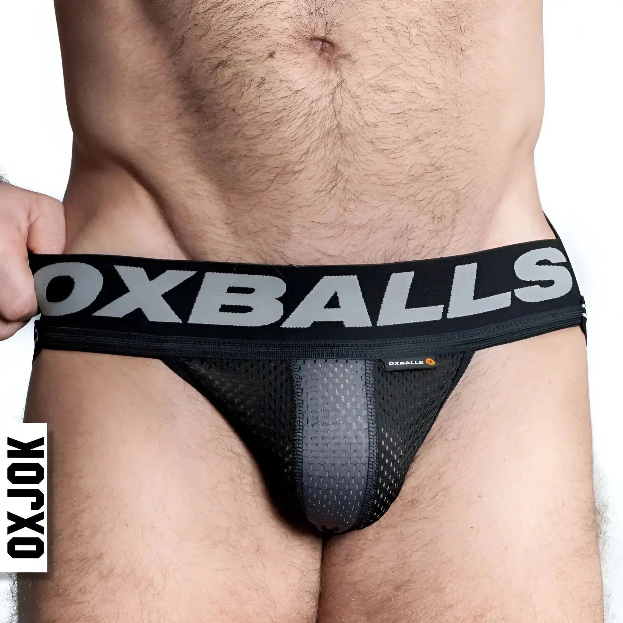 Black mesh oxballs airmesh swagger jockstrap tar with gray oxballs logo on waistband in size xl front view