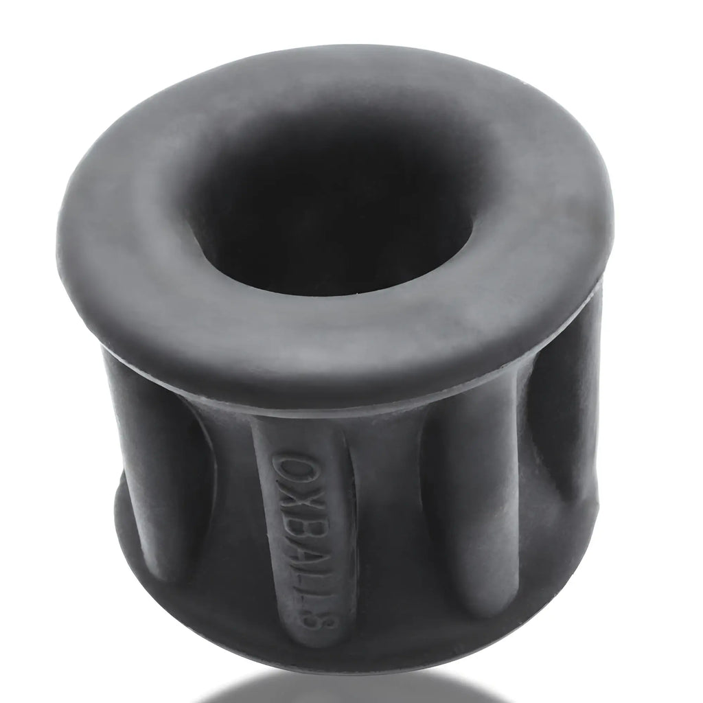 Black rubber oxballs baller centre squeeze ball stretcher cylindrical insert with ribbed sides and central hole