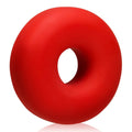 A vibrant red smooth silicone donut-shaped cockring from oxballs big ox red ice collection