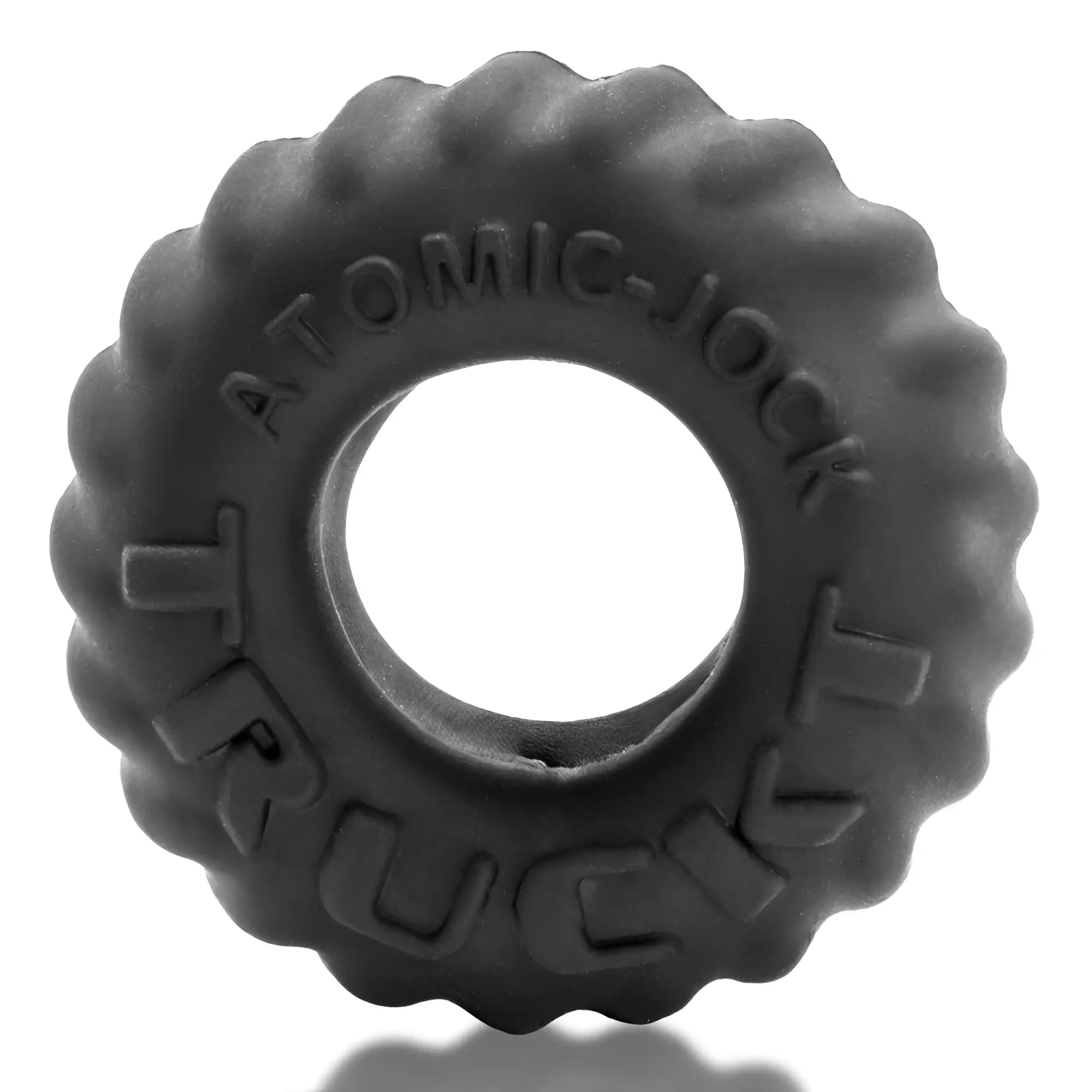 Black rubber cock ring with tire-like ridges and embossed atomic-jock branding oxballs bone maker 3-pack boner night
