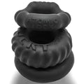 Black silicone atomic lock ring set with textured layered design from oxballs bone maker 3-pack boner cock ring night