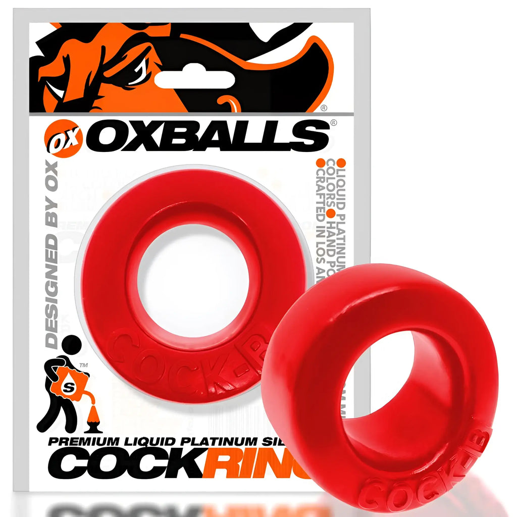 Red silicone cockring with embossed cockring text in oxballs branded retail card for bulge enhancement