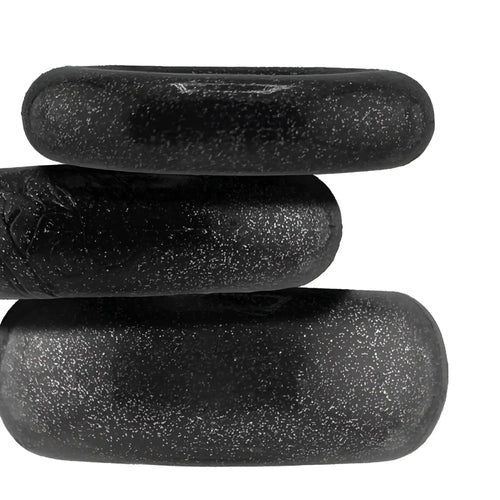Oxballs cockpack 3 pc ring set black with three stacked black textured oval silicone rings with matte speckled finish