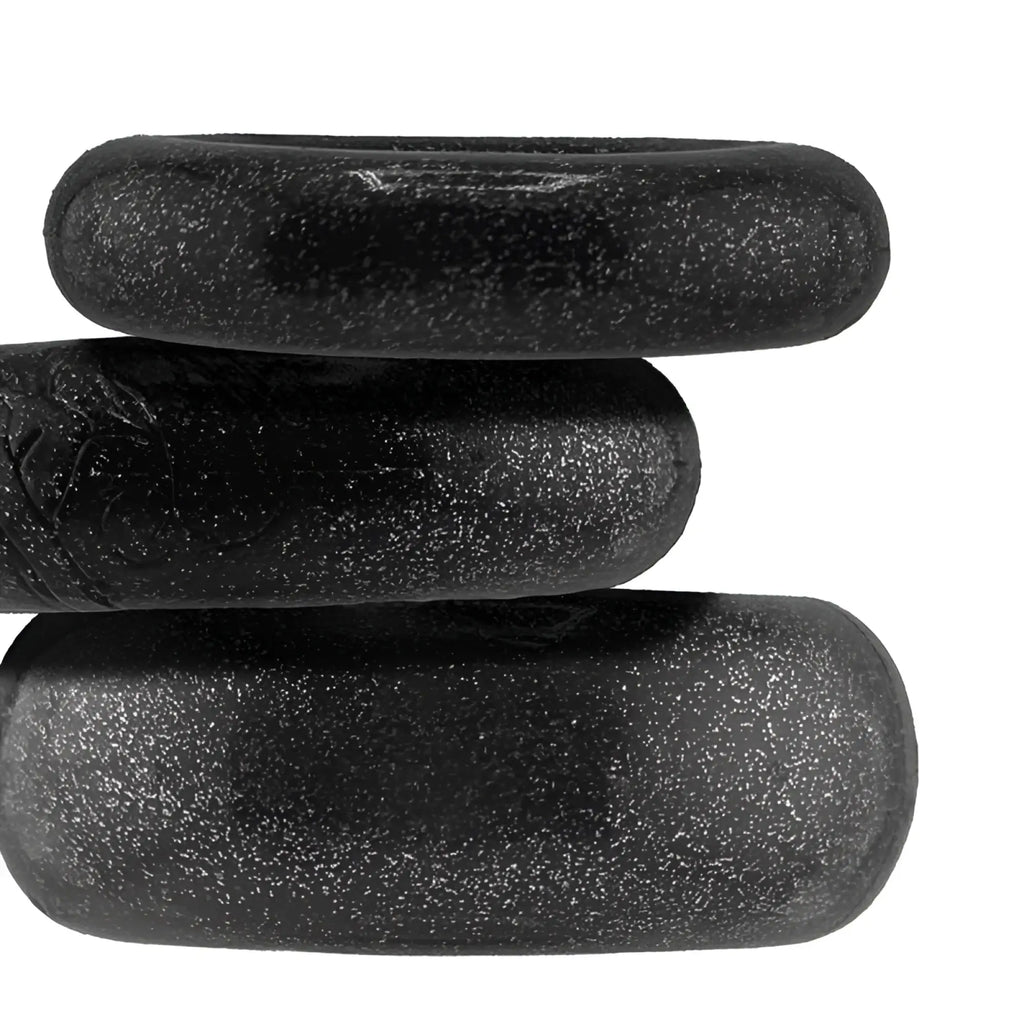 Oxballs cockpack 3 pc ring set black with three stacked black textured oval silicone rings with matte speckled finish