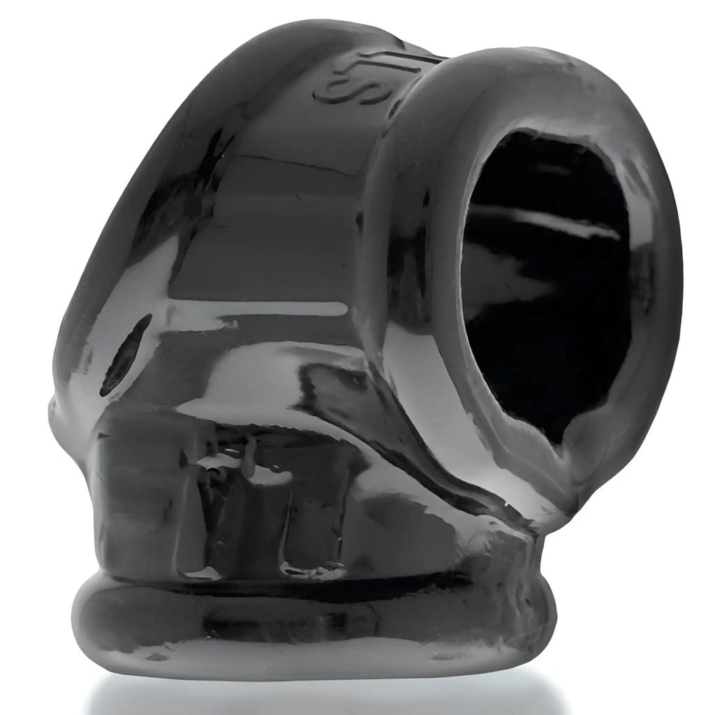 Black glossy silicone skull-shaped anal plug with embossed OxBalls branding from CockSling FIT collection in black