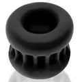 Black silicone OxBalls Core Grip squeeze ball stretcher with textured ribbed lower half and smooth upper surface