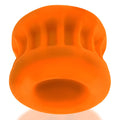 Bright orange silicone oxballs core grip chef’s hat-shaped massage tool designed as a squeeze ball stretcher