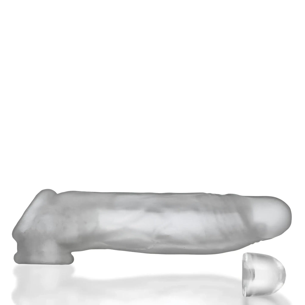 Clear translucent silicone dildo with rounded tip and textured surface oxballs dicker ultra-slim cocksheath clear ice