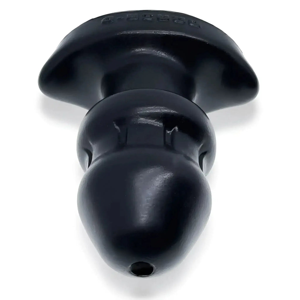 Black silicone anal plug with flared base and textured grip oxballs drain o flow thru buttplug black s