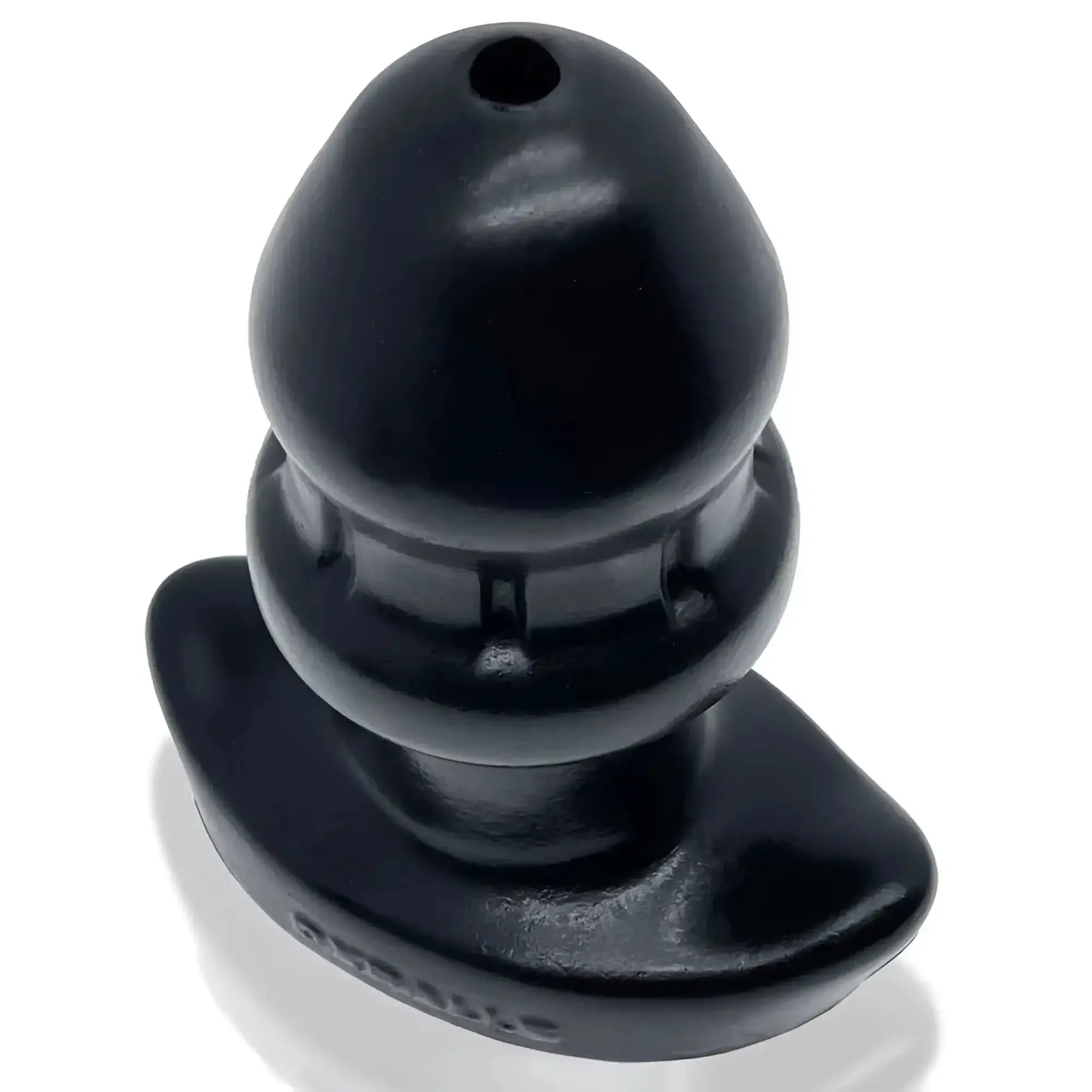 Black silicone oxballs drain o flow thru buttplug s with textured grip and rounded head for comfortable use