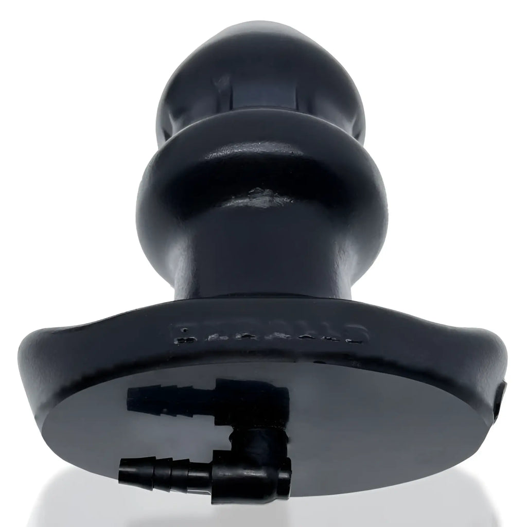 Black silicone anal plug oxballs drain o flow thru with textured ridges flared base and integrated tubing ports