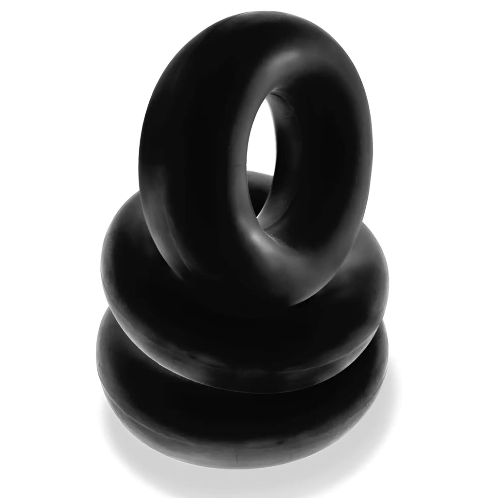 Black rubber tiered stack of oxballs fat willy jumbo cockrings made of stretchy material one size fits all