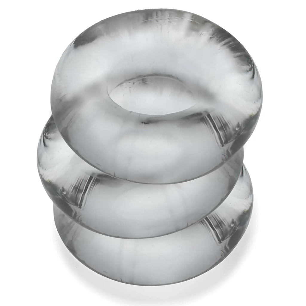 Stacked translucent clear oxballs fat willy 3 pc jumbo cockrings with smooth textured surface and subtle reflections