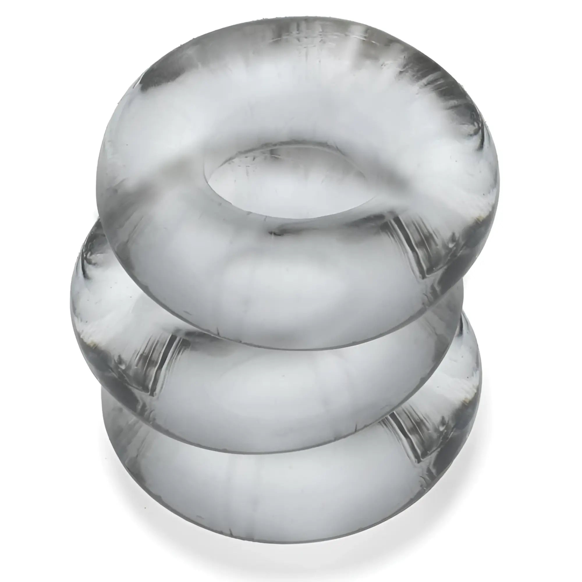 Stacked translucent clear oxballs fat willy 3 pc jumbo cockrings with smooth textured surface and subtle reflections