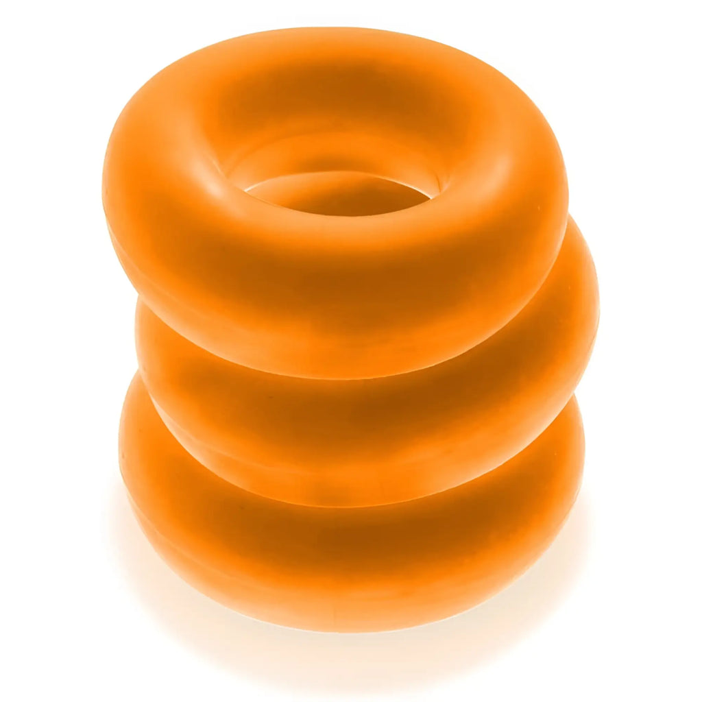 Orange silicone ring stack of oxballs fat willy 3 pc jumbo cockrings in one size for enhanced fit and comfort