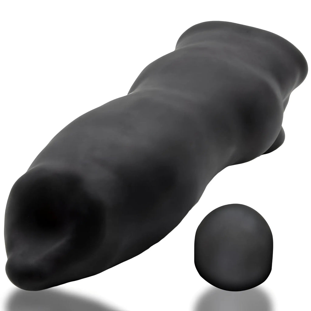 Black silicone anal plug with matching spherical base oxballs fido velvet-smooth beast night back side view