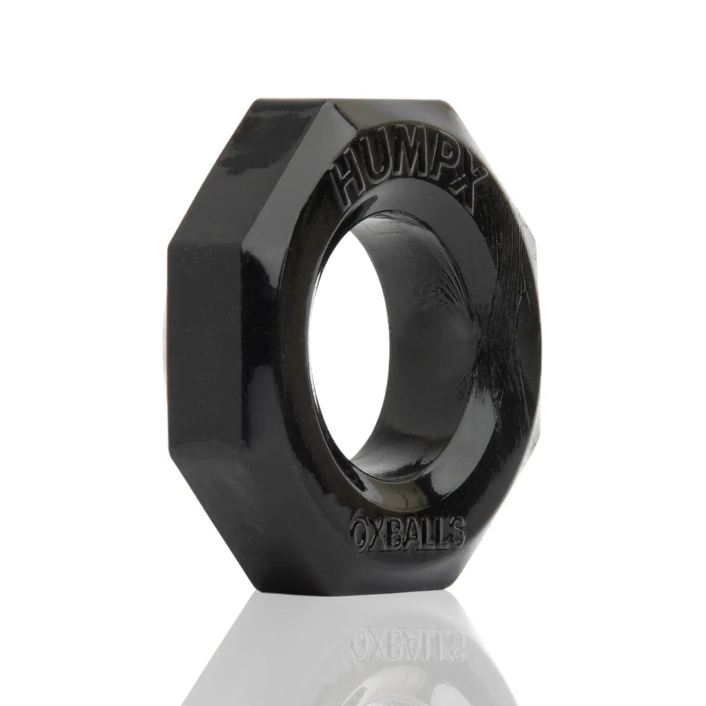 Black glossy hexagonal oxballs humpx cockring with engraved branding on sides for enhanced grip and style