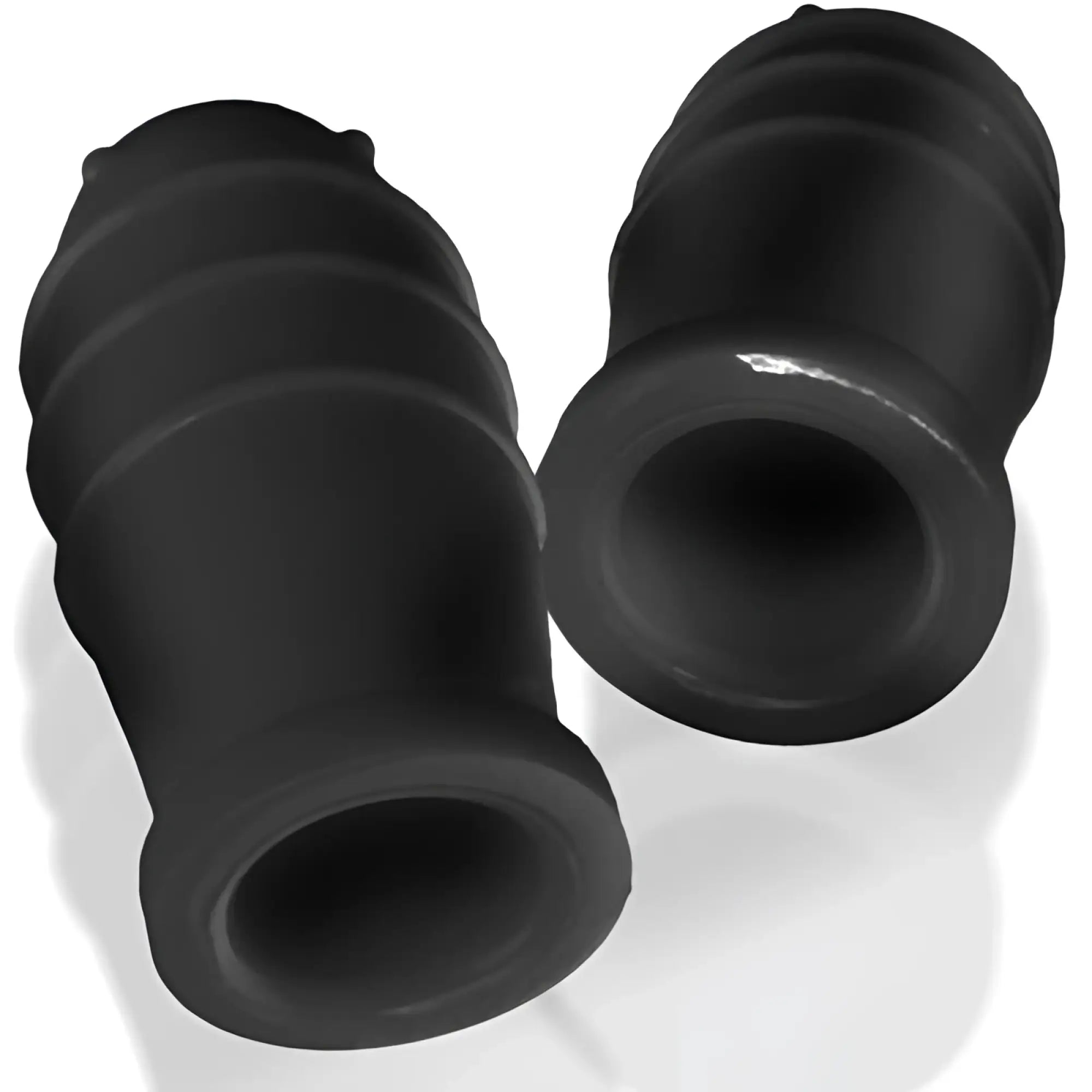 Black rubber hose couplings with ribbed texture and cylindrical shape in oxballs lankyz silicone nipsuckers black one size