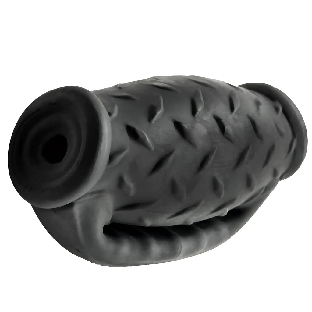 Black rubber exhaust pipe cover with diamond plate texture and flared ends in oxballs masterjack double penetration JO black ice