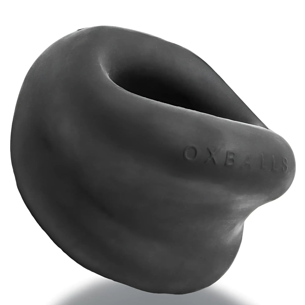 Black oxballs meat big bulge cock ring with smooth rounded silicone design and embossed branding on front side