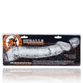 Clear transparent silicone OxBalls Muscle Ripped cocksheath with textured surface and adjustable insert shown from the back side