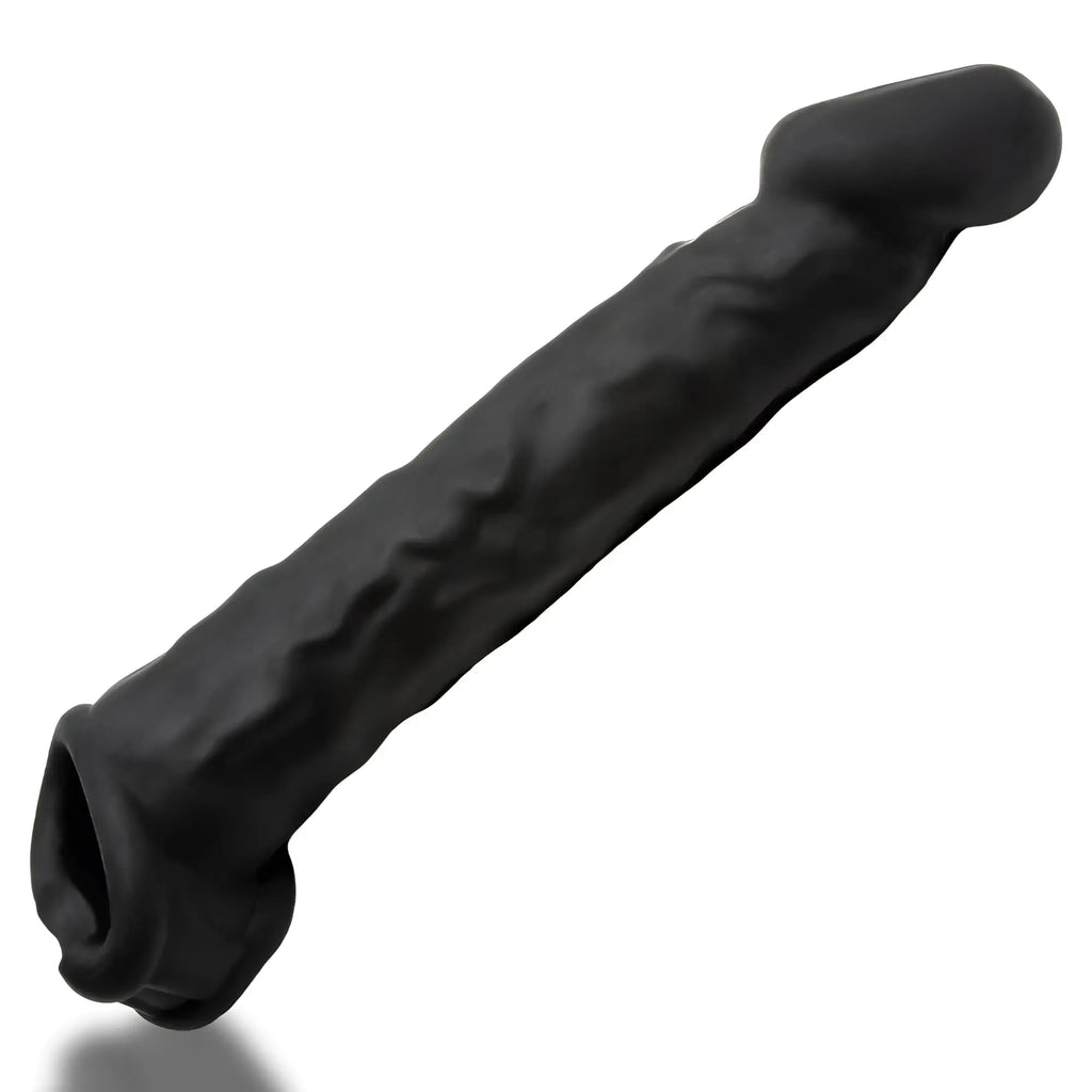 Black silicone cock ring with textured surface and tapered ends oxballs muscle ripped inner ribbed velvet-smooth night