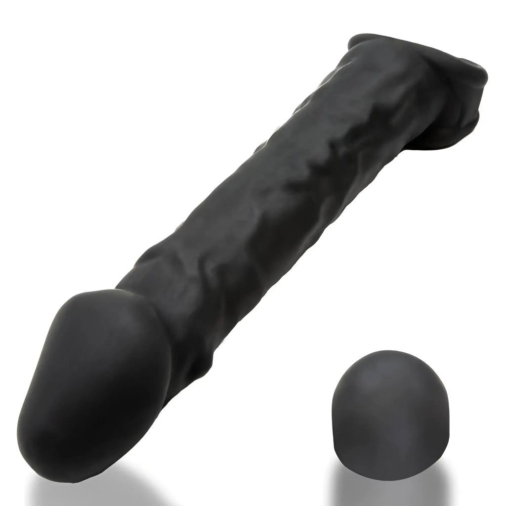 Black silicone dildo with rounded head and textured shaft featuring a matching black spherical tip by OxBalls